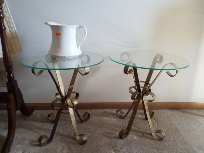 2 matching small glass tables 