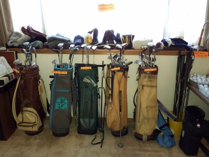 Golf bags,  clubs, ball, new gloves and more