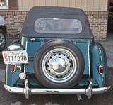 1952 MG Midget convertible. For more info see -- http://youtu.be/ITNnywg9d5s