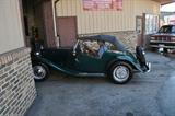 1952 MG Midget convertible. For more info see -- http://youtu.be/ITNnywg9d5s