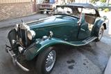 1952 MG Midget convertible. For more info see -- http://youtu.be/ITNnywg9d5s