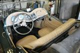 1952 MG Midget convertible. For more info see -- http://youtu.be/ITNnywg9d5s