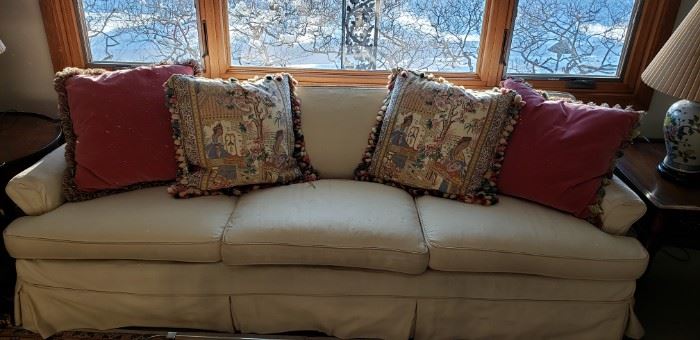 Couch with beautiful throw pillows