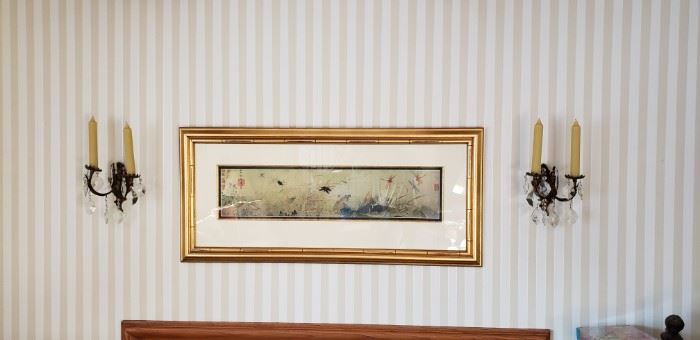 Oriental framed artwork and two wall sconces