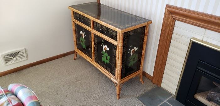 Oriental bamboo furniture there and two of these