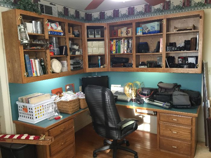 Lots of office and computer supplies, office chair and a very nice collection of cameras and accessories