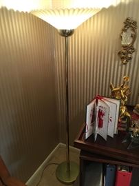 Floor lamp, metal base and stem.