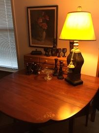 Drop leaf table, small drawers, ruby glass and lamp