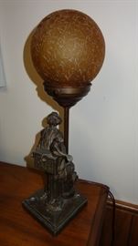 Metal figural organ grinder lamp. Intact and working