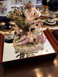 This piece is damaged. It has one leaf broken off.