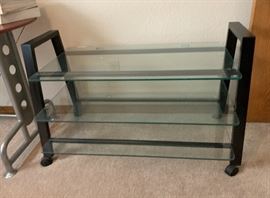 Omni Mount Glass/Steel Rowling TV Cart Stand 25x40.5x20.5in HxWxD