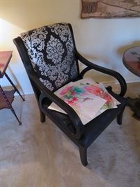 ONE OF A PAIR OF OVERSIZED BLACK LACQUER ARMCHAIRS