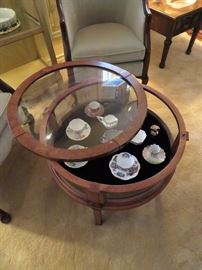 INTERESTING ROUND SHOWCASE COFFEE TABLE WITH REMOVABLE TOP 