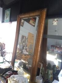 Measures 8ft by 4 ft rattan framed mirror (2 pieces , slightly damaged) $150 at my warehouse