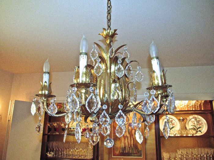 CRYSTAL AND BRASS CHANDELIER AND MATCHING WALL SCONCES.