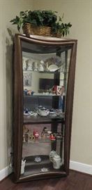 Curio cabinet with sliding door