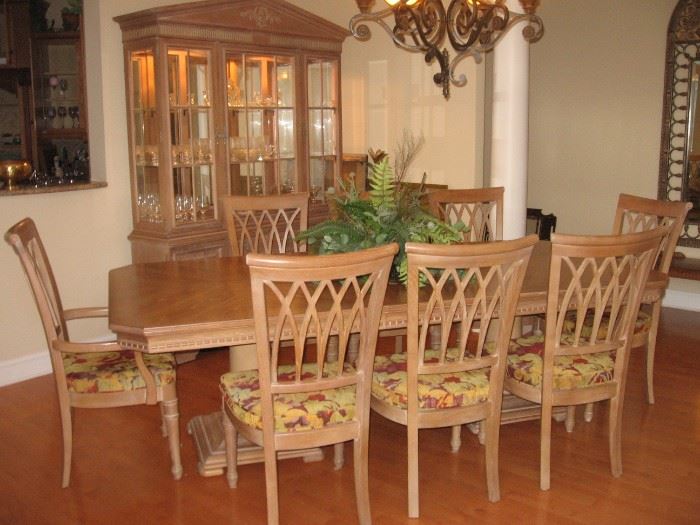 Blonde wood dining table 
w/ 2 leaves (16” each)"
8 dining chairs: 2 arm and six side chairs

