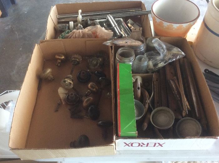 Box of old door knobs. And vintage hardware