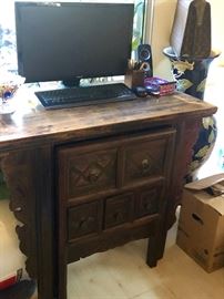 Hand carved desk with pull-out hidden chair