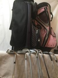 Eight Golf Irons, Two Golf Bags