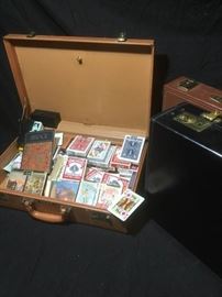 Playing Cards Galore with Three Briefcases
