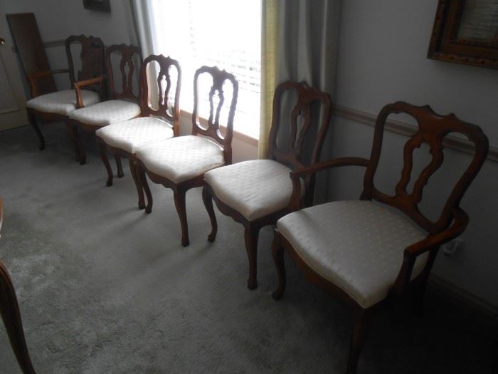 In the dining room there are 2 captains chairs - 4 side chairs
