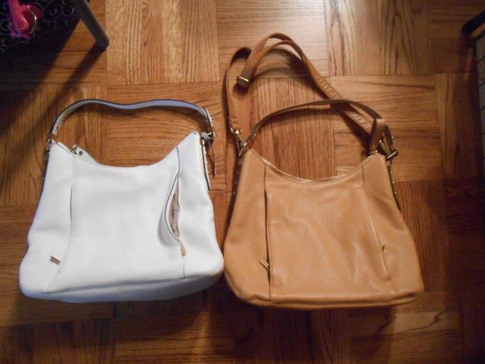 Michael Kors look-a-like leather purses.  2 zippered front pouches.