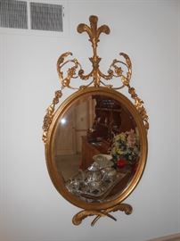 Antique Rococo oval beveled mirror
