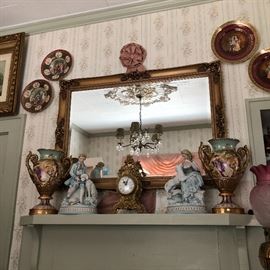 Mirror, Andrea figurines, brass clock, European urns