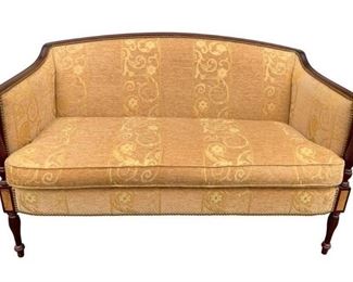 Custom High End, Hickory Chair Loveseat, James River Collection. Classic design and elegant fabric. The graceful, slender, needed and tapered legs make this classic Sheraton love seat a classic style. It features an exposed wood rail across the top back and arms. Delicate inlay is featured at each corner, along with detail between corner and arm. Decorative nail trim lends enhancement to the low back and slight proportions of the piece. Medium Mahogany is the standard finish as shown. 1-piece bench Spring-Down seat cushion. (Information from the Hickory Chair site)