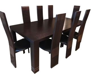 Maurice Valencie, Italian Espresso 15 Piece Dining Collection, Grand Extendible Table with 12 Side Chairs.<br> <br> The clever high end Italian design, allows for the table extensions to be attached at the end of each table. Avoiding the unattractive center line seen in most tables. Table, 12 Chairs, 2 Side Extensions. Listed Price $31,000, Purchased for $17,000 