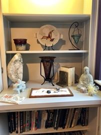 Various decor pieces and hundreds of books.