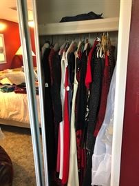 Two closets filled with ladies clothing!