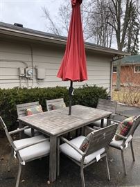 Metal patio set with 6 chairs, umbrella and cushions. 