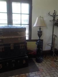 Black cherub pedestal 