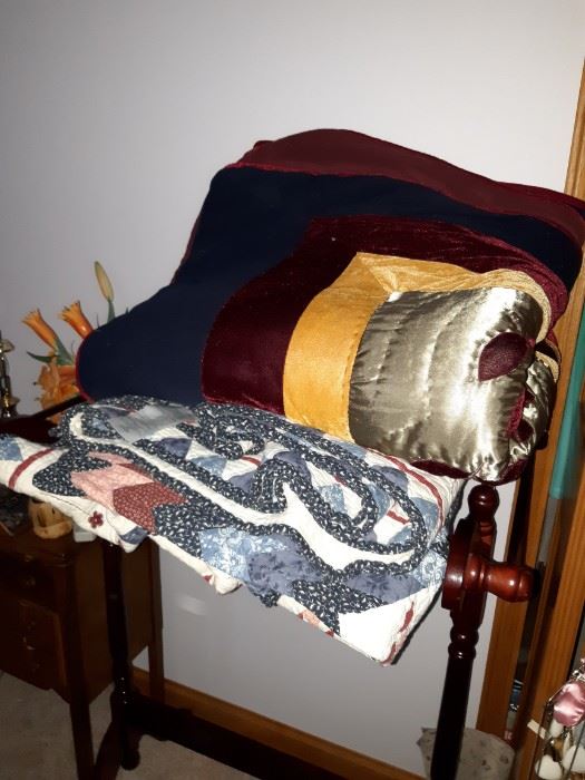 Vintage quilts and quilt rack