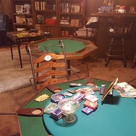 Three card tables; one has fixed legs, two are portable, one is antique