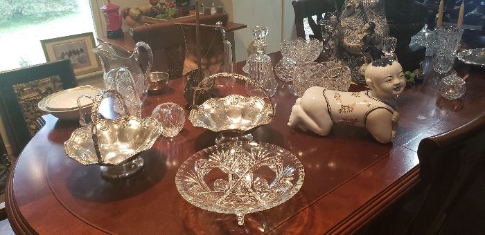 Much fine cut crystal, Waterford, antique English silver, asian blue and white porcelain.