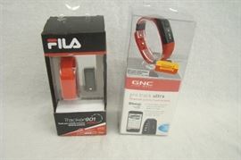 Pair of FILA and GNC Fitness Tracker Watches