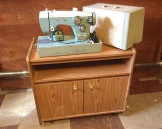Federal Sewing Machine & Wheeled Cart https://ctbids.com/#!/description/share/120707