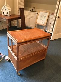 #29	tan wicker tv stand w shelf and swivel top  on wheels30x18x29	 $75.00 	