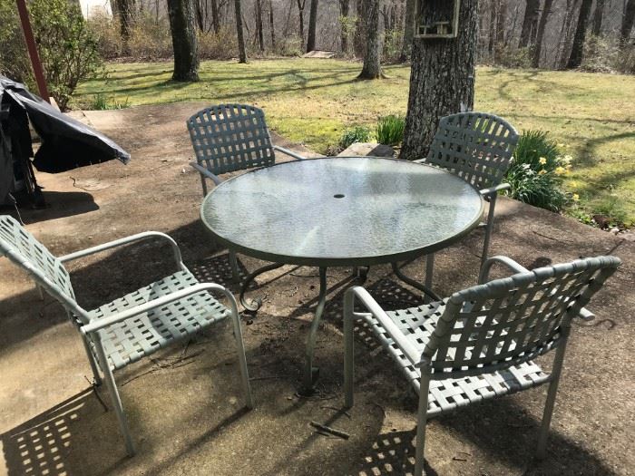 #20	Glass Top Metal/Base Patio Table   48" Roundx28T w/4 chairs	 $75.00 
