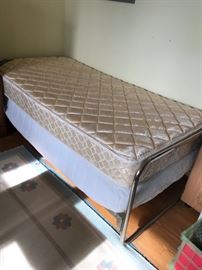 #34	twin bed w metal frame 	 $50.00 
