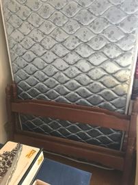 #54	twin wood bed frame w mattress 	 $65.00 
