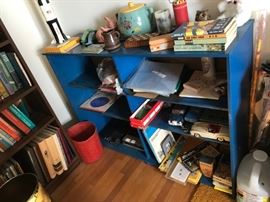 #56	wood blue painted bookcase w 6 shelves 48x13x35	 $60.00 
