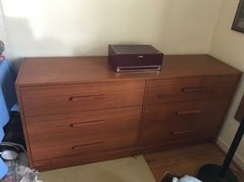 #58	mid century style 6 drawer chest w laminate good gliding drawers  58x16x27	 $100.00 
