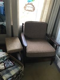 #60	mid century wood and brown cushion chair 	 $125.00 
