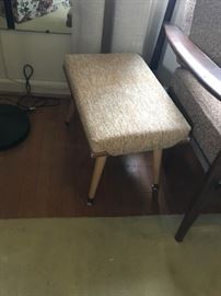 #61	mid century stool w 4 legs and tan fabric top 	 $25.00 
