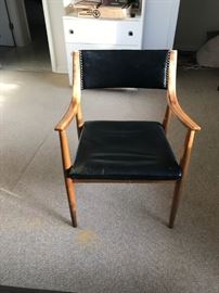 #74	mid century wood and black chair 	 $100.00 
