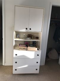 #75	white laminate cabinet w 3 drawer 2 doors and 4 shelves 30x19x72	 $75.00 
